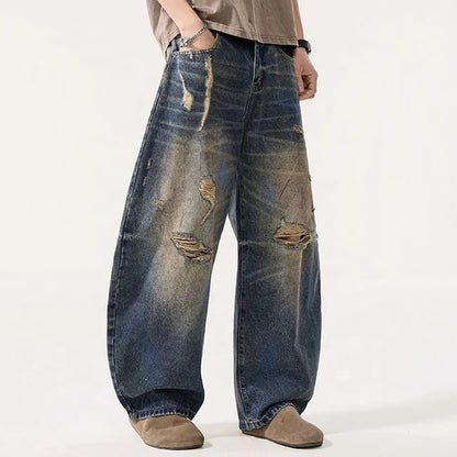 Distressed Wide Leg Jeans in Vintage Blue Wash